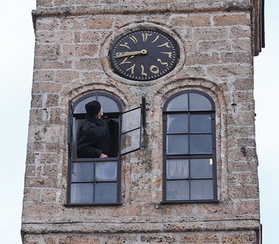 Zlatar checks the clock face on the tower's exterior. (AA Photo)