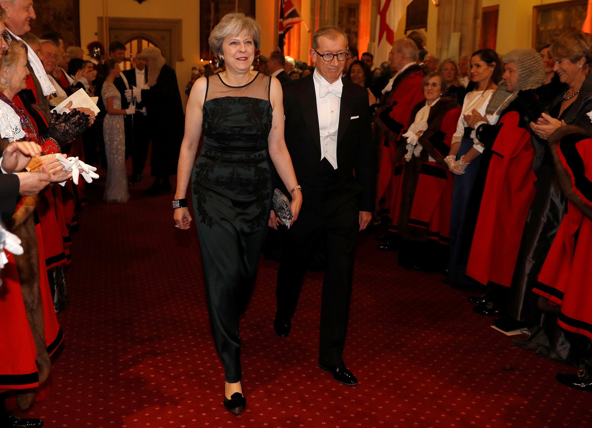 Britain's Prime Minister Theresa May arrives with her husband Philip at the Lord Mayor's Banquet at the Guildhall, in London, Britain November 13, 2017. (Reuters Photo)