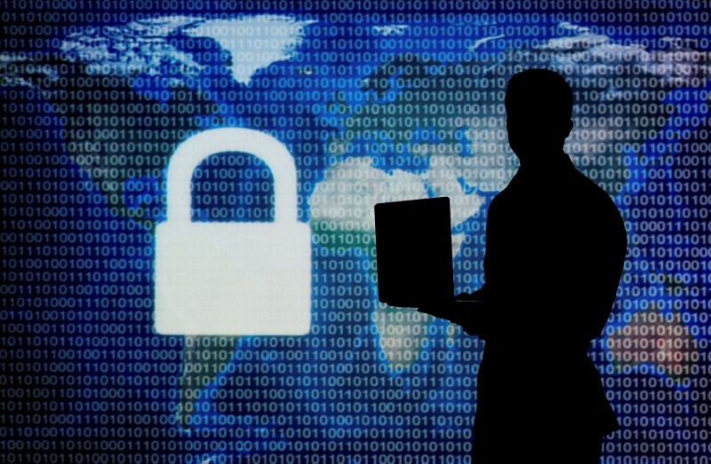 Man holding laptop. (GETTY IMAGES/iSTOCK/FILE Photo)