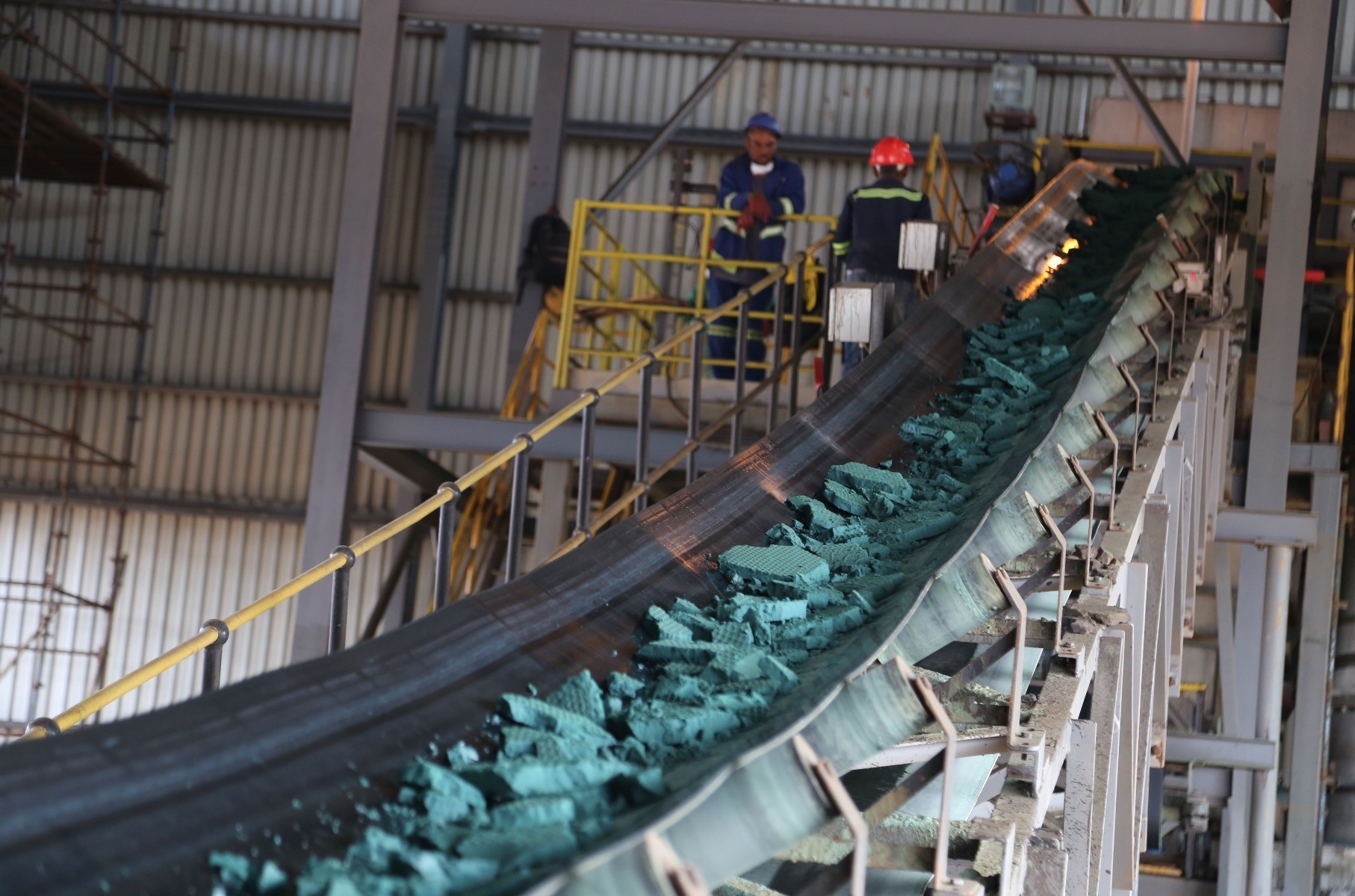 A conveyor belt carries chunks of raw cobalt after a first transformation at a plant in Lubumbashi before being exported to be refined, mainly to China.