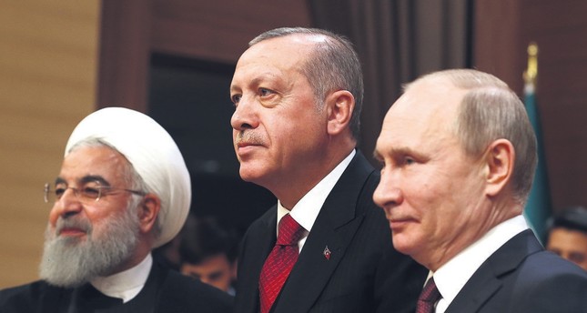 Iranian President Hassan Rouhani, (L), Russian President Vladimir Putin (R) and President Recep Tayyip Erdoğan reaffirmed their commitment to Syria's territorial integrity during a summit in Ankara yesterday.