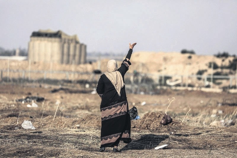 A Palestinian woman during the demonstrations to mark the Nakba, when more than 700,000 Palestinians were forcefully expelled from their villages in the war that led to the creation of the state of Israel in 1948, east of Gaza Strip, May 15.