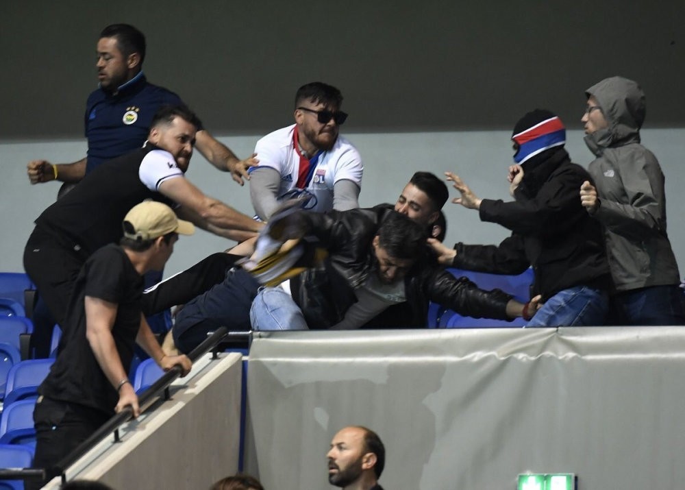 Lyonu2019s fans were so prepared that some of them wore masks before attacking the Turkish fans during the UEFA Europa League Quarter Final First Leg at Parc Olympique Lyonnais on Apr. 13.