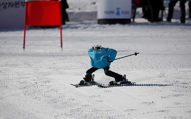 Robot Tae Kwon V skies during the Ski Robot Challenge at a ski resort in Hoenseong, South Korea, Feb. 12, 2018. (Reuters Photo)