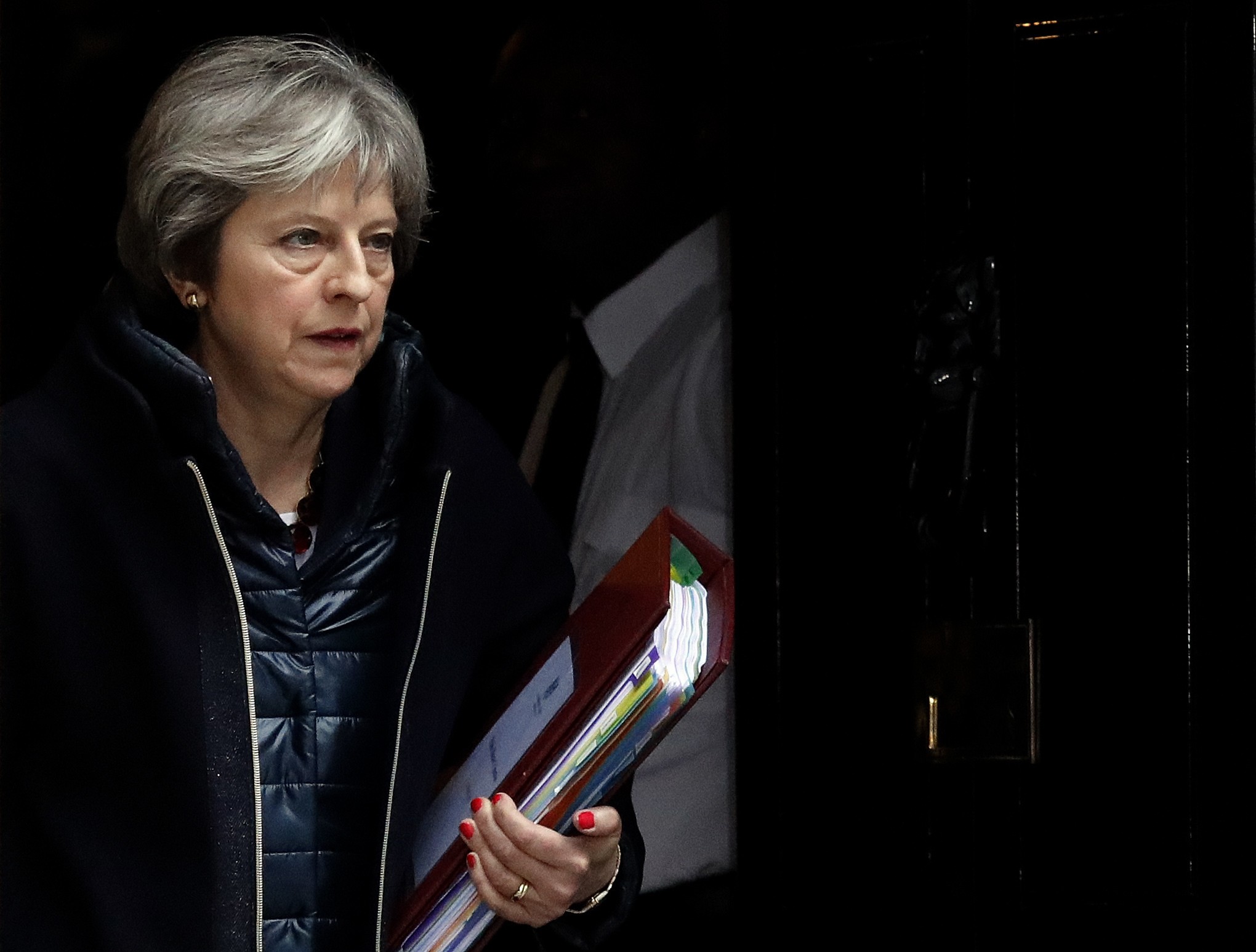Britain's Prime Minister Theresa May leaves 10 Downing Street to attend the weekly Prime Minister's Questions session, in parliament in London, March 14, 2018. (AP Photo)