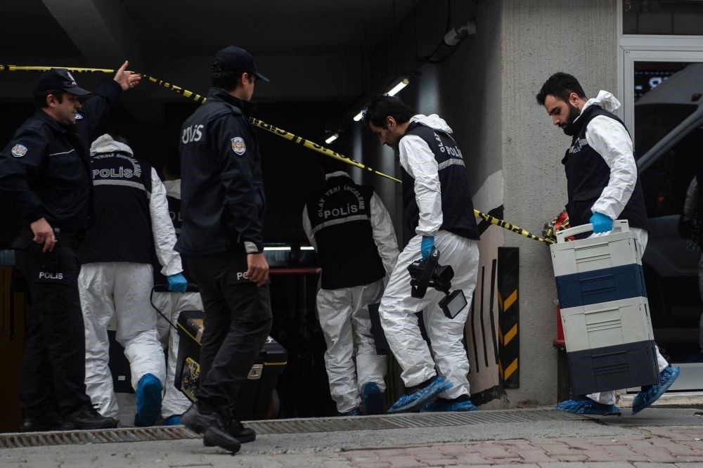 Forensic police officers stand at an underground car park cordoned off by Turkish police after they found an abandoned car belonging to the Saudi Consulate on Oct. 23.