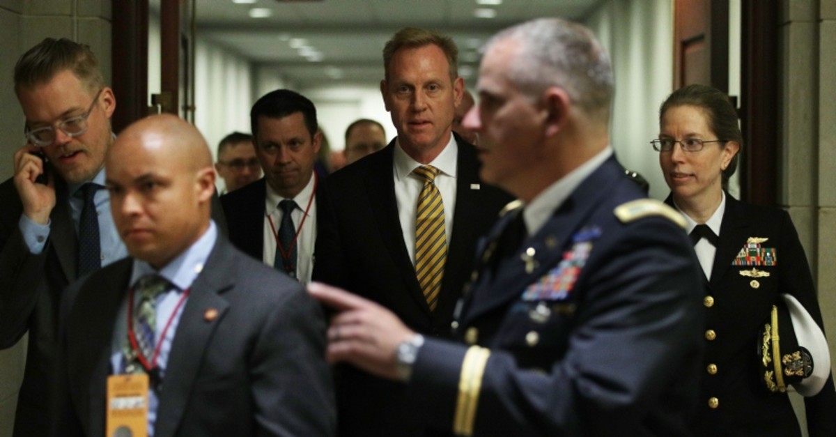 Acting U.S. Defense Secretary Patrick Shanahan (C) arrives at a closed briefing for Senate members May 21, 2019 on Capitol Hill in Washington, D.C. (AFP Photo)