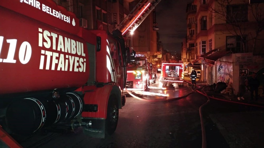 Istanbulu2019s firefighters respond to a fire at night.