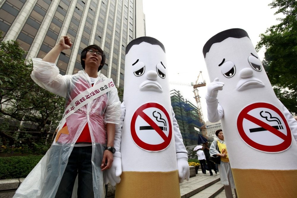 Anti-smoking activists protest tobacco products during a rally in South Korea on the International No Tobacco Day, May 31.