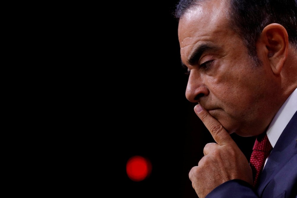 Carlos Ghosn, former chairman and CEO of the Renault-Nissan Alliance, reacts during a news conference in Paris, France, Sept. 15, 2017.