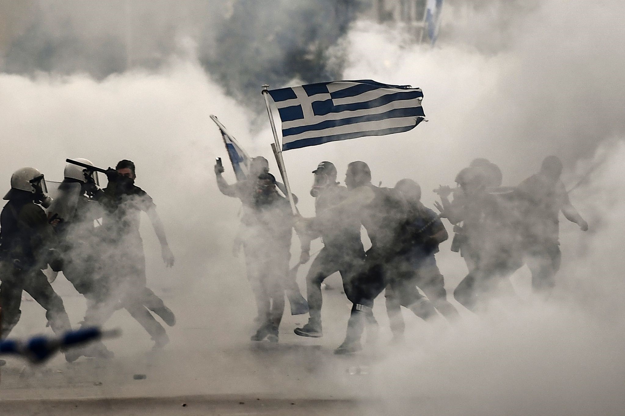 Protesters clash with police during a demonstration against the agreement reached by Greece and Macedonia, Thessaloniki, Sept. 8.