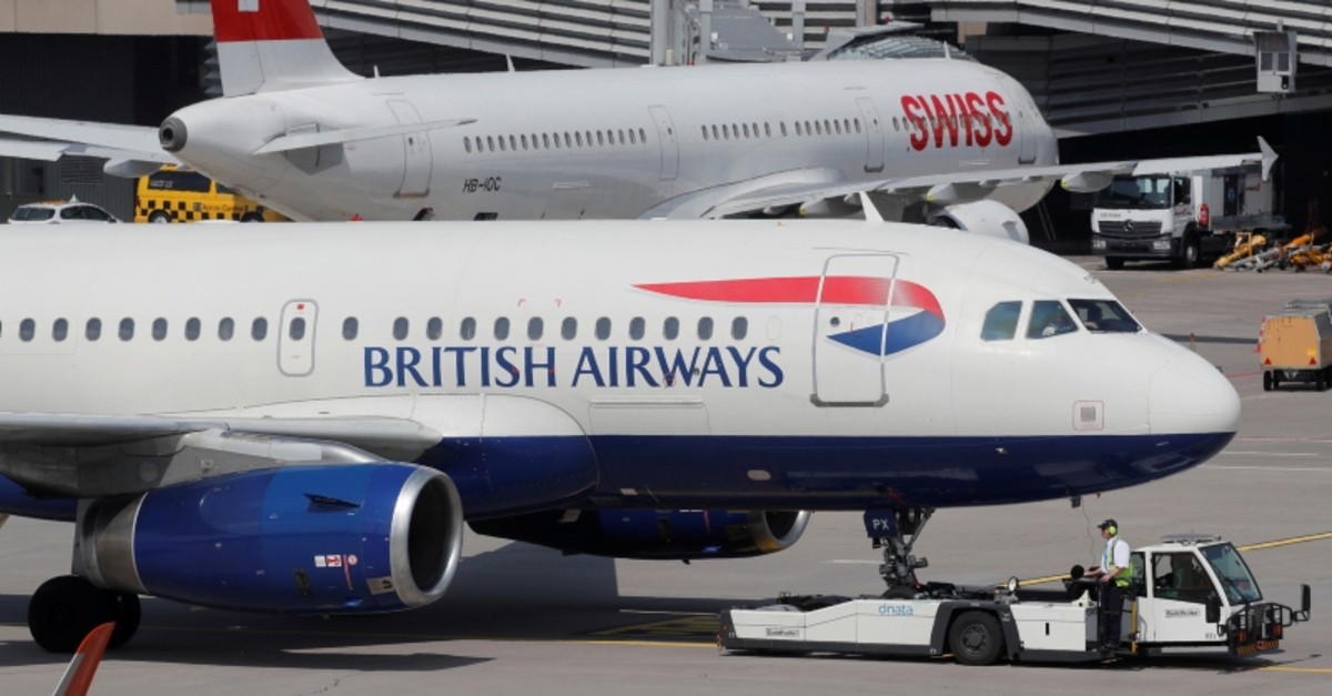 An aircraft of British Airways airlines is pulled by a Goldhofer pushback tractor of air service provider DNATA at Zurich airport, Switzerland April 16, 2019.  Picture taken April, 16, 2019 (Reuters Photo)