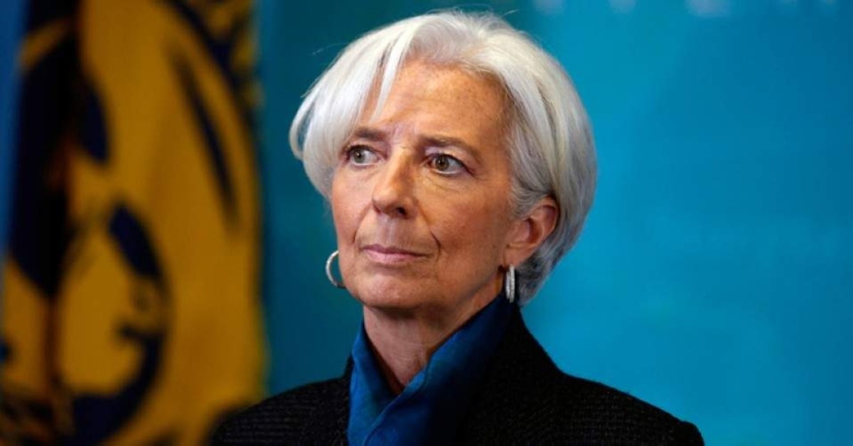 International Monetary Fund (IMF) Managing Director Christine Lagarde, waits to greet British Prime Minister David Cameron, before a round table meeting at the IMF, Thursday, Jan. 15, 2015 in Washington. (AP Photo)