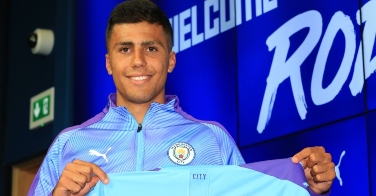 Manchester City's new signing Rodri displays his shirt during a press conference at the Etihad stadium in Manchester, northwest England on July 4, 2019.