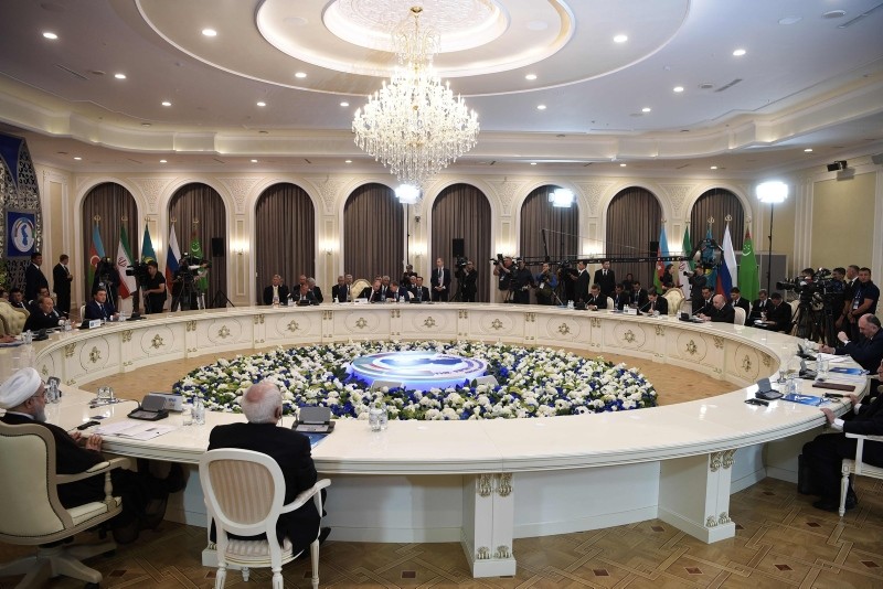 Heads of the Caspian region countries take part in a plenary session during the 5th Caspian Summit in Aktau on August 12, 2018. (Photo by Alexey Nikolsky / Sputnik / AFP)