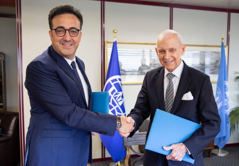 Turkish Airlines Chairman M. Ilker Aycu0131 (L) meets with IOM Director-General William Swing (R) in Geneva, 10 Sept. 2018. (AA Photo)