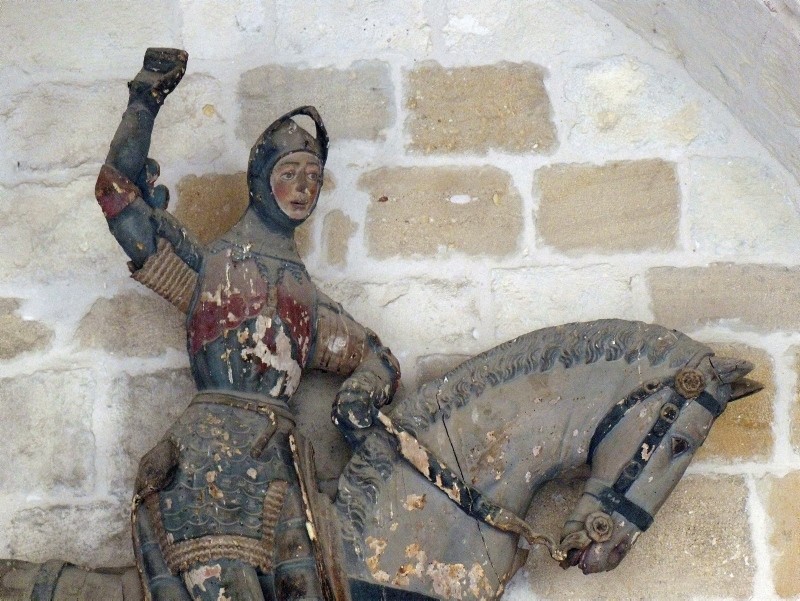 This undated handout photo released on Wednesday, June 27, 2018 shows the 16th-century wooden figure of St. George before it was restored, at St. Michael's Church in Estella, in northern Spain. (AP Photo)