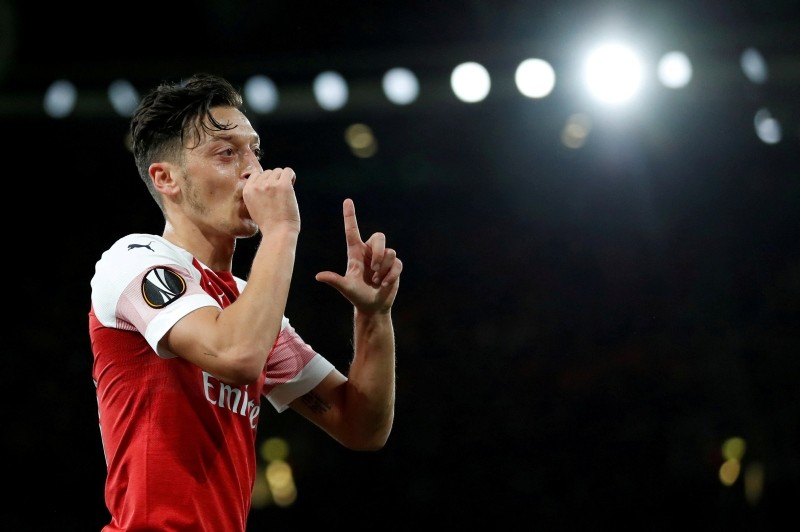 Arsenal's Mesut Ozil celebrates scoring their fourth goal against FC Vorskla Poltava in London, Britain on September 20, 2018. (Reuters)