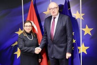 Trade Minister Ruhsar Pekcan (L) shakes hand with European Commissioner for Trade Phil Hogan, Brussels, Belgium, Dec. 20, 2019. (AA Photo)
