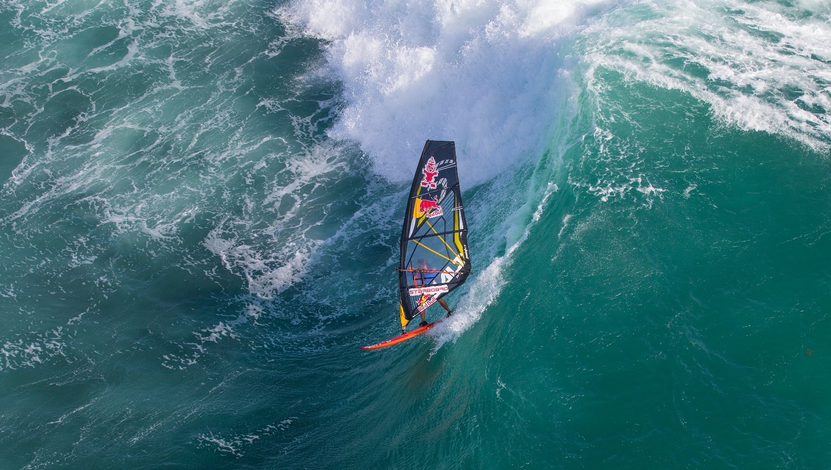 Lena Erdil competes at  a windsurfing event.