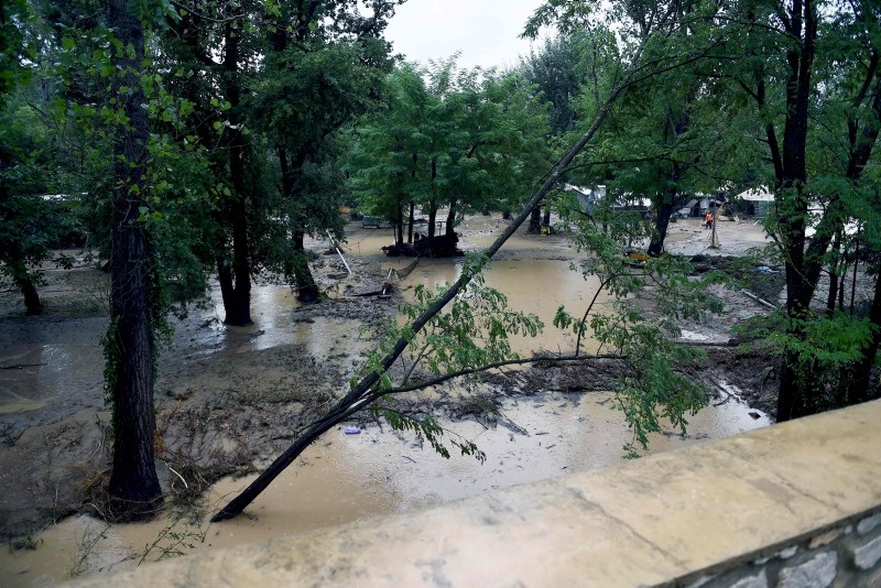 This picture shows a flooded and damaged camping as storms and heavy rains sweep across France on August 9, 2018 in Saint-Julien-de-Peyrolas, southern France. (AFP Photo)