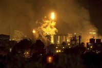 Smoke rise following a big explosion at an industrial hub near the port city of Tarragona, Spain, Tuesday, Jan. 14, 2020. (AP Photo)