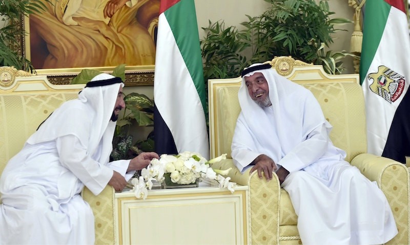 A handout photo by Emirates News Agency (WAM) shows UAE President Khalifa bin Zayed Al Nahyan (R), talks to Sheikh Dr. Sultan bin Muhammad Al Qasimi, UAE Supreme Council member, the Ruler of Sharjah, in Abu Dhabi, UAE, June 25, 2017. (EPA Photo)