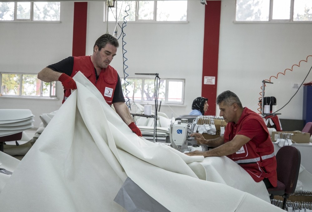 Workers sew tents at Red Crescent's factory in Ankara's Etimesgut district.