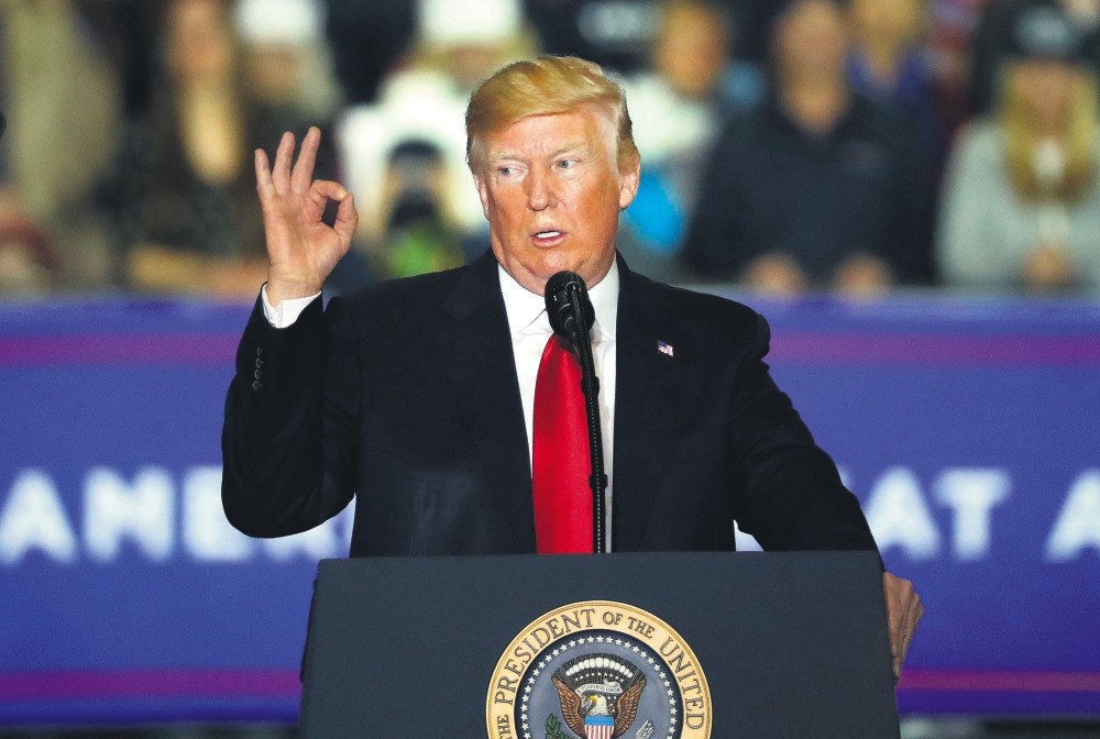 U.S. President Donald Trump gestures during a campaign rally in Washington, April 28.