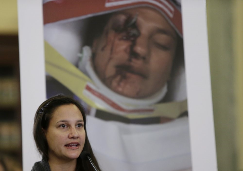 U.S. Air Force First Lt. Stephanie Erdman suffered a serious eye injury (rear photo) when the Takata airbag in her 2000 Honda Civic deployed and sent shrapnel flying. She testified before the Senate in 2014.