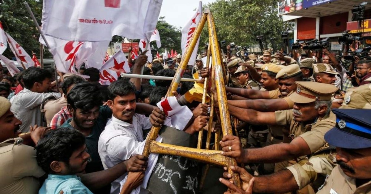 Police officers stop demonstrators during a protest against a new citizenship law, in Chennai, India, Dec. 21, 2019. (Reuters Photo)