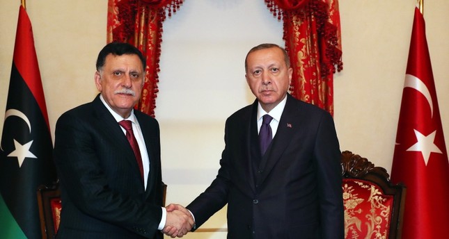 الرئيس أردوغان مع رئيس حكومة الوفاق الليبية، السراج الأناضول