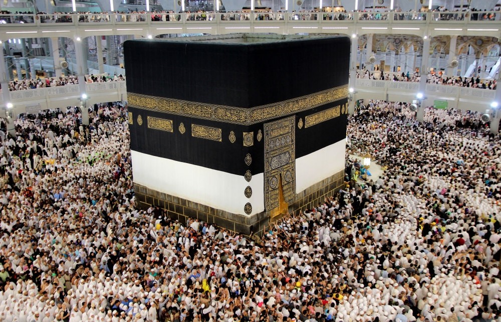 Muslims pilgrims at the Kaaba performing their religious duty.