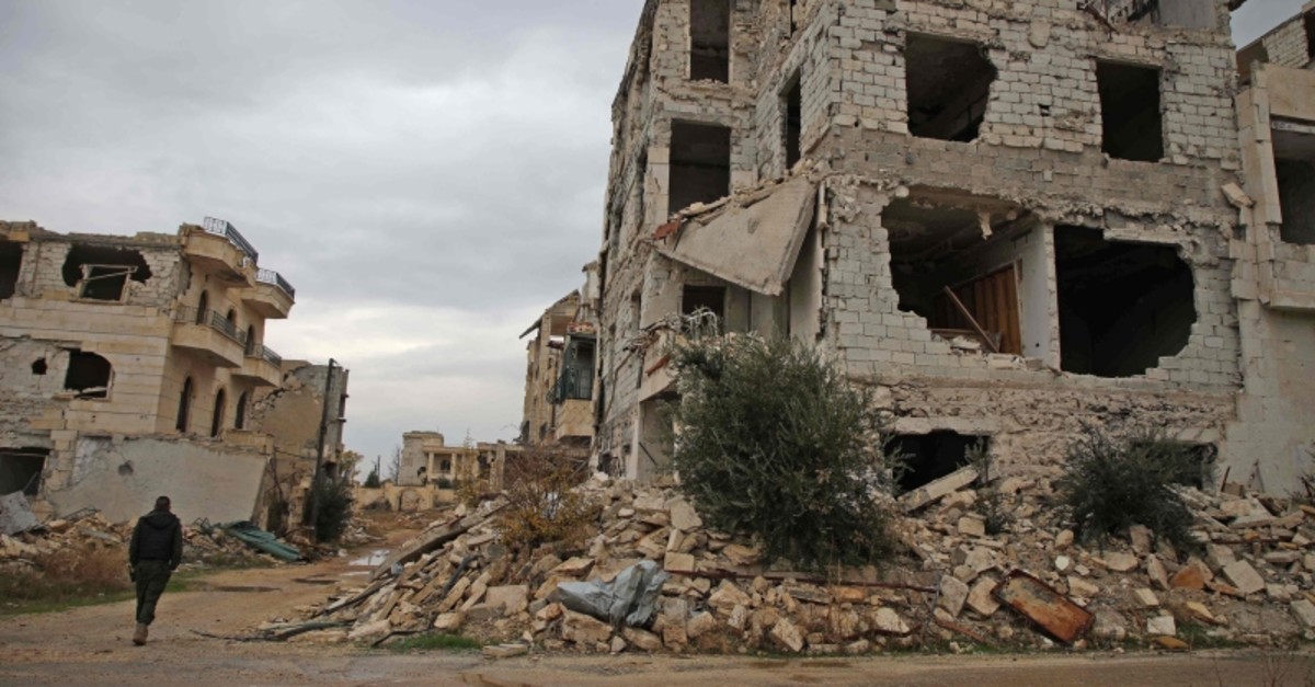 This Nov. 26, 2018, photo shows a damaged building in the opposition-held Al-Rashidin district of western Aleppou2019s countryside near Idlib province. (AFP Photo)