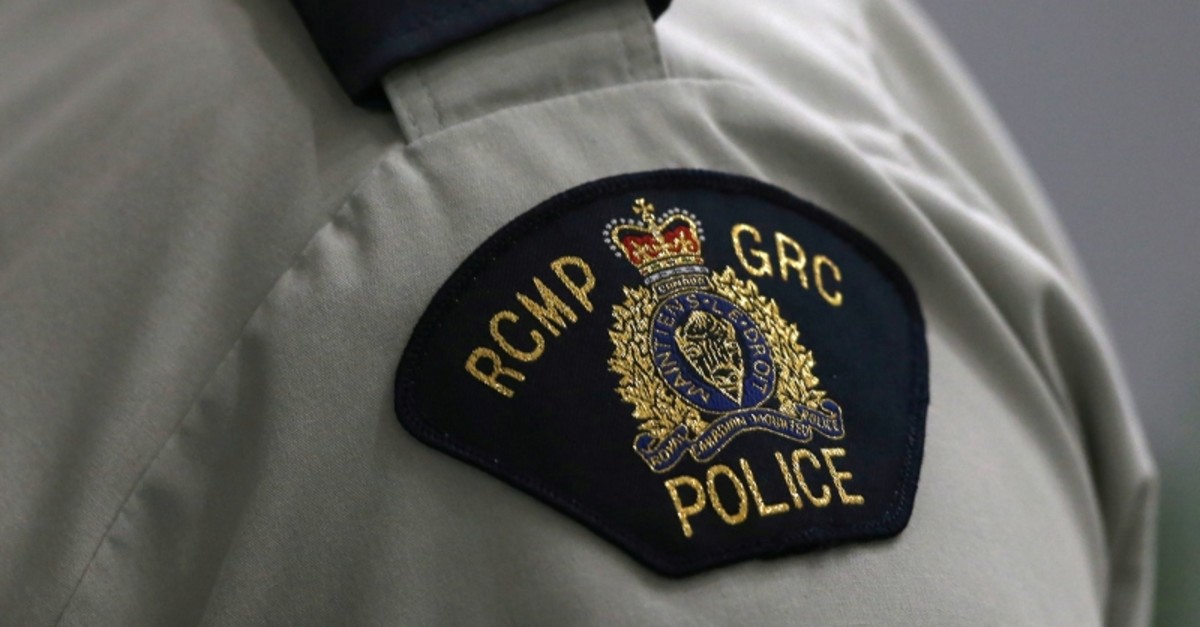 A Royal Canadian Mounted Police (RCMP) crest is seen on a member's uniform, at the RCMP ,D, Division Headquarters in Winnipeg, Manitoba Canada, July 24, 2019 (Reuters Photo)