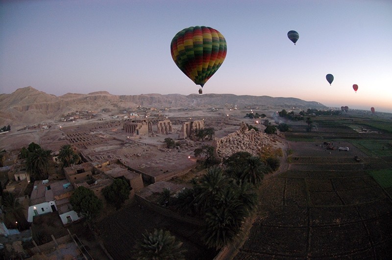 This file photo taken on November 15, 2007 shows tourist hot air balloons floating during dawn across Egypt's Valley of the Kings, near Luxor. (AFP Photo)