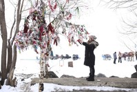 People hang colorful pieces of cloth on the branches of wishing trees to get one step closer to having their wishes come true.