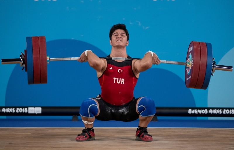 Muhammed Furkan u00d6zbek in action during the Men's 56kg weightlifting competition, Youth Olympic Park, Buenos Aires, Oct. 9. (Reuters Photo)
