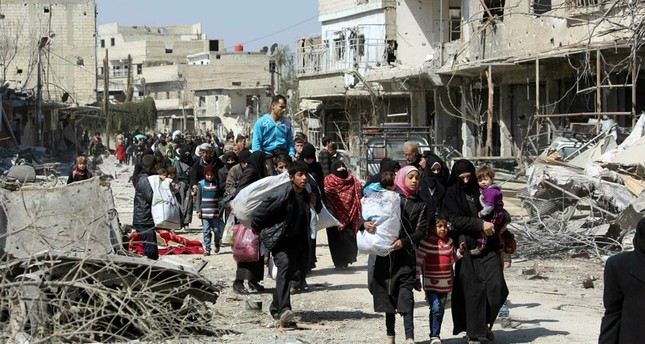 التهجير القسري لسكان الغوطة بعد حصار 5 سنوات من الأرشيف