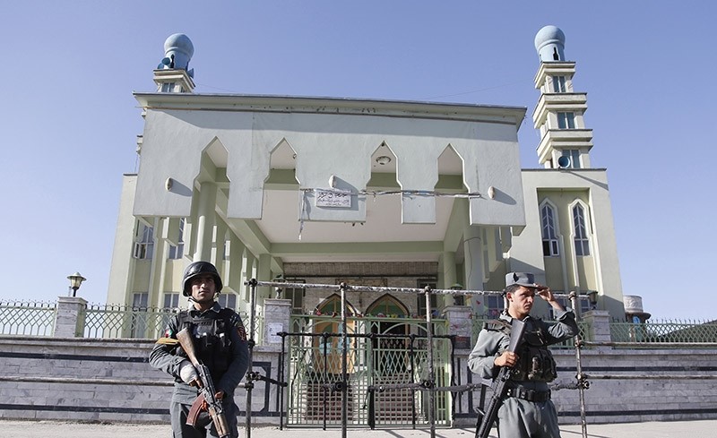 Afghan Police secure the scene after an overnight attack on a Shi'ite mosque in Kabul, Afghanistan, 16 June 2017 (EPA Photo)