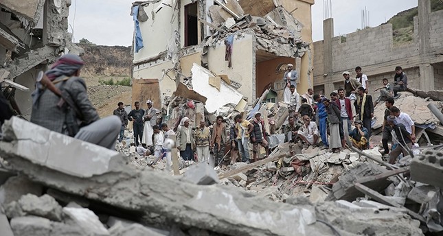 In this Aug. 25, 2017 file photo, people inspect the rubble of houses destroyed by Saudi-led airstrikes in Sanaa, Yemen. (AP Photo)