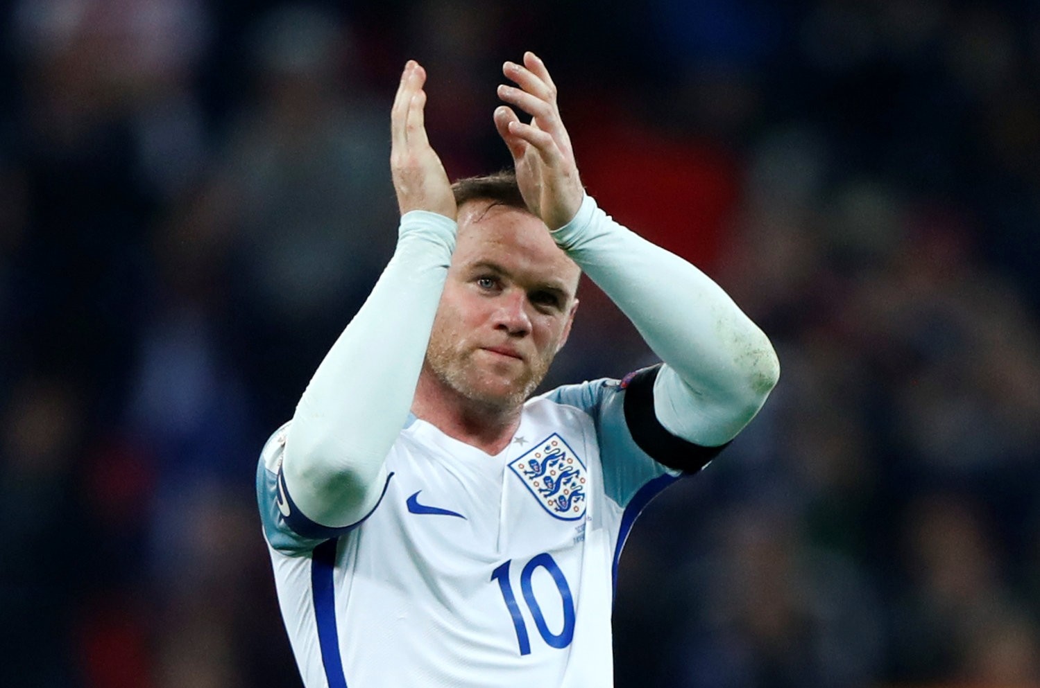 England's Wayne Rooney applauds fans after the game. (REUTERS Photo)