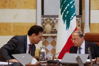 Lebanon's Prime Minister Hassan Diab speaks with Lebanon's President Michel Aoun during a cabinet meeting at the presidential palace in Baabda, Lebanon Feb. 6, 2020. (Reuters Photo)