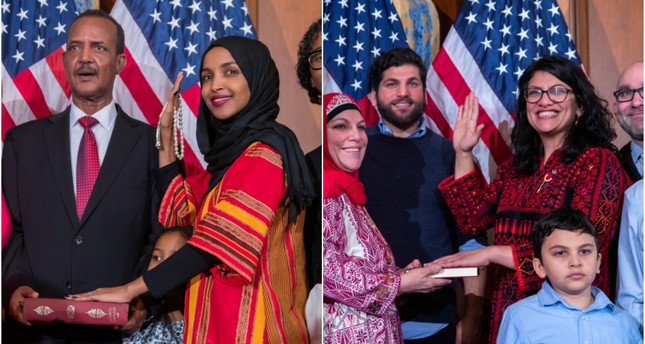 Ilhan Omar (L) and Rashida Tlaib (R) take their oaths of office. (EPA/AA Photos)