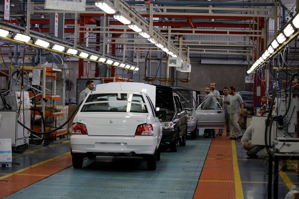 Cars are seen inside the Saipa Syria Factory in the industrial city of Hassia in Homs.