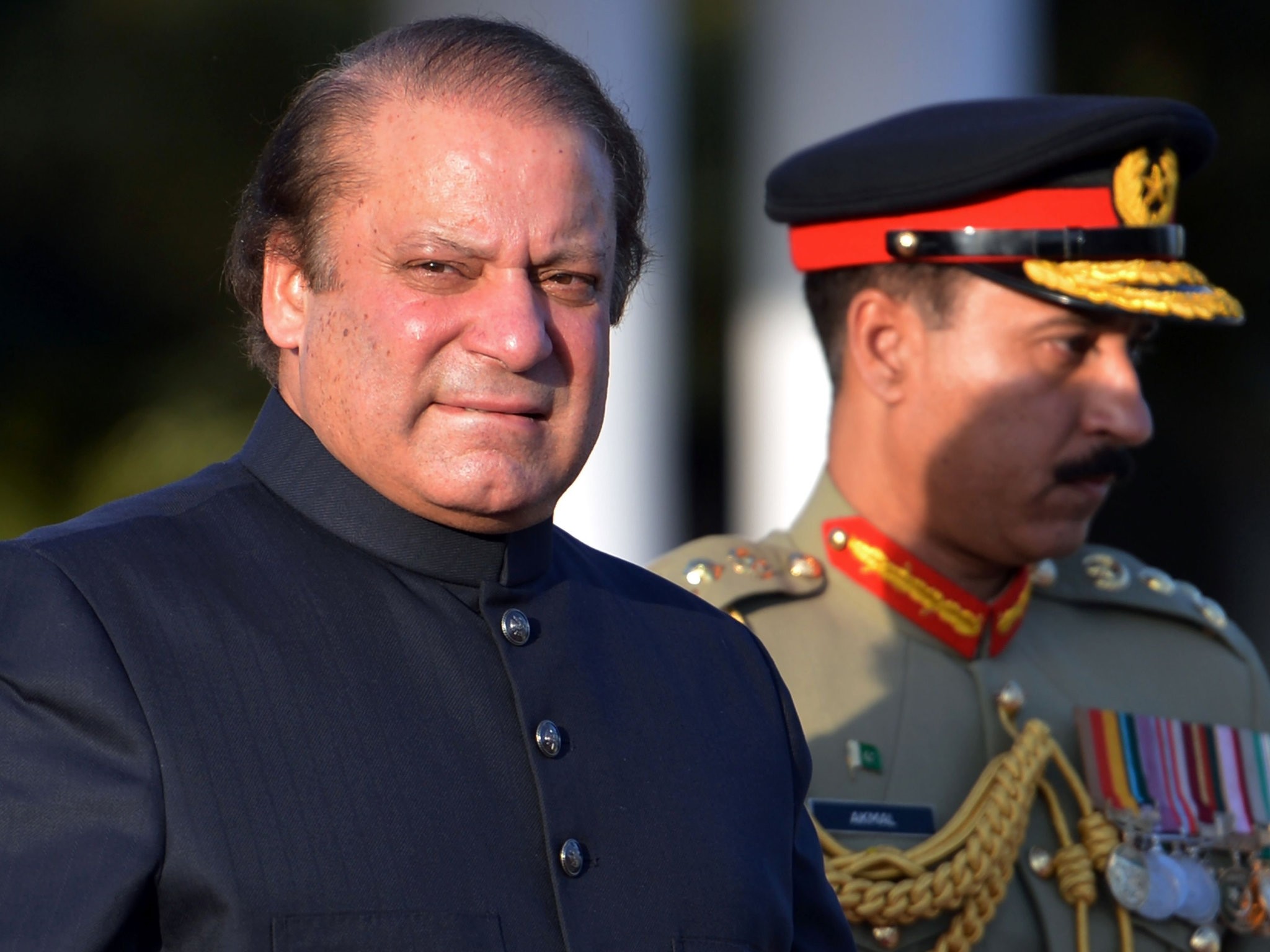 In this file photograph taken on June 5, 2013, Pakistani Prime Minister Nawaz Sharif arrives to inspect a guard of honour during a welcoming ceremony at the Prime Minister's House in Islamabad. (AFP Photo)