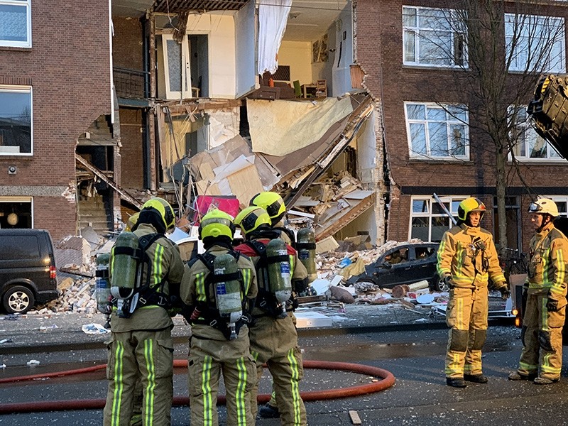 Authorities respond after a three-story home collapsed in The Hague, Netherlands on Sunday, Jan. 27, 2019. (AP Photo)