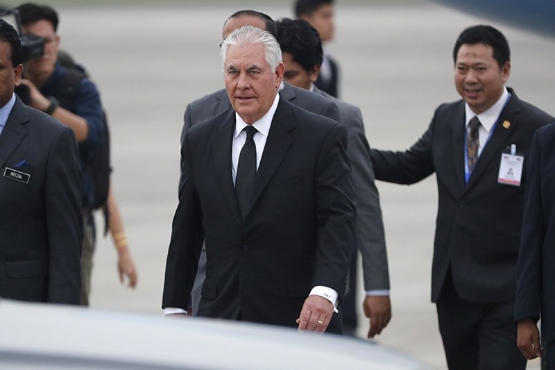 U.S. Secretary of State Rex Tillerson, center, arrives at a military base in Subang, Malaysia, Tuesday, Aug. 8, 2017. (AP Photo)