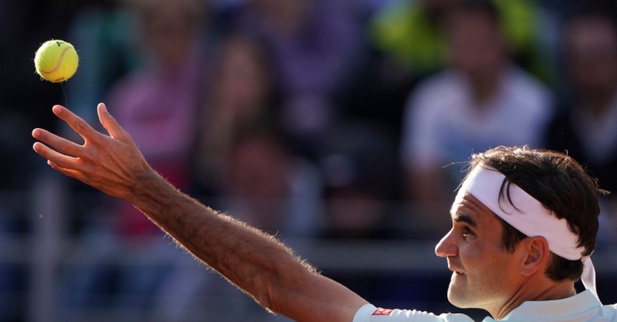 Roger Federer of Switzerland serves the ball to Borna Cedric of Croatia at the Italian Open tennis tournament, in Rome, Thursday, May 16, 2019. (AP Photo)