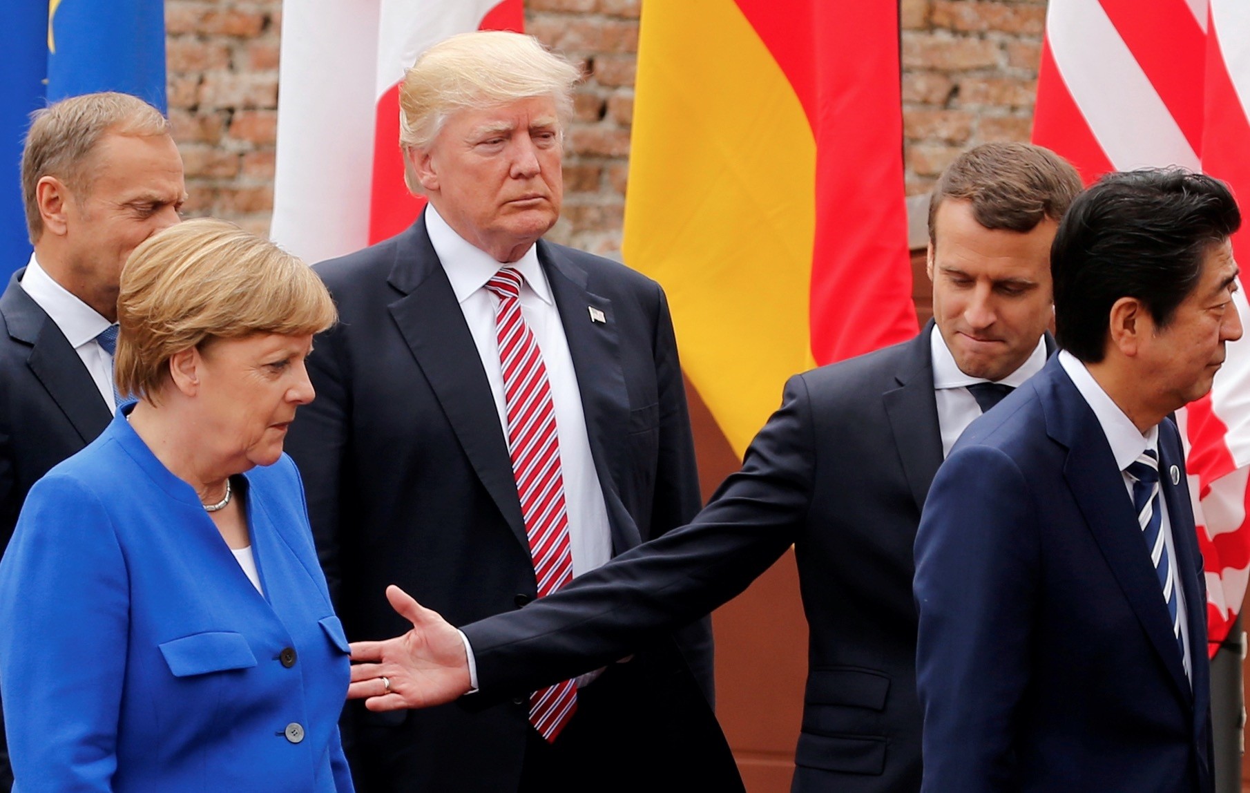 (From left to right) European Council President Donald Tusk, German Chancellor Angela Merkel, U.S. President Donald Trump, French President Emmanuel Macron and Japanese Prime Minister Shinzo Abe after a group photo during the G7 Summit